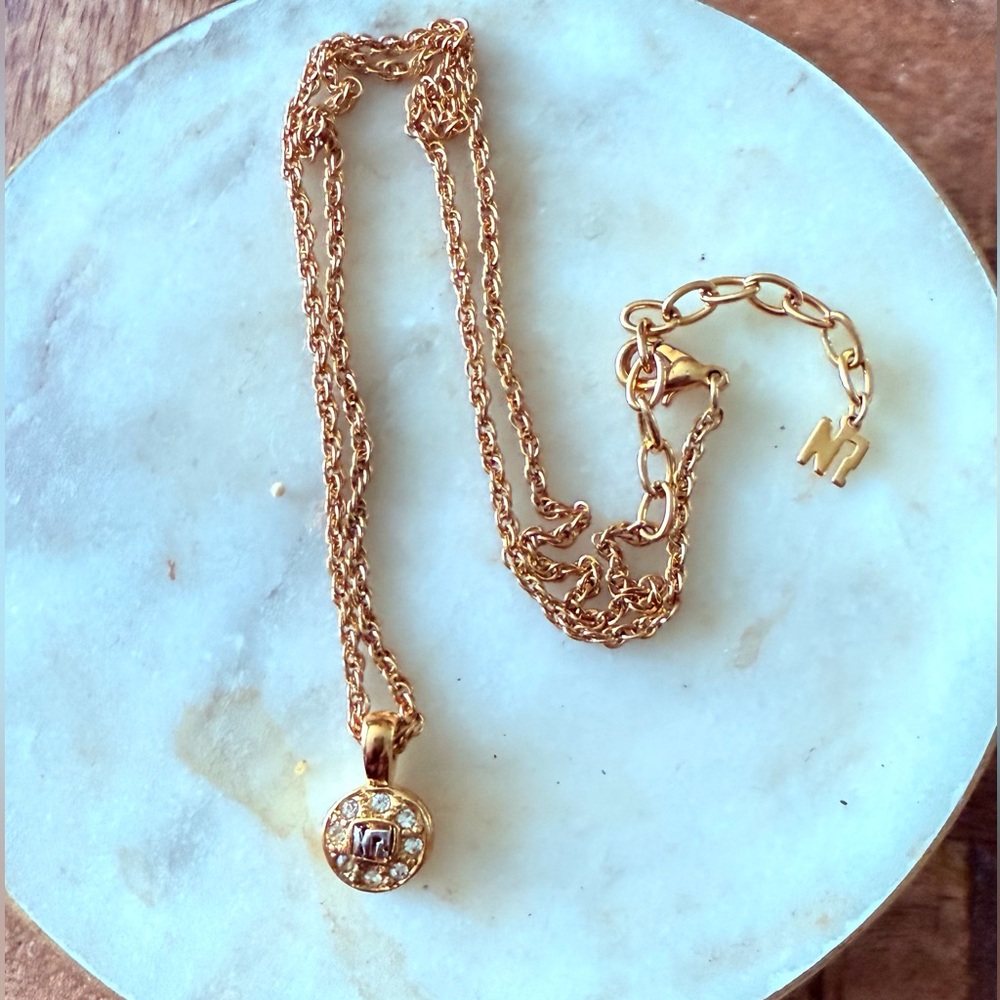 Nina Ricci Gold Pendant Necklace with Crystal Accents